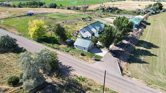 42.9 Acres of Agricultural Land with Home for Sale in Ontario, Oregon