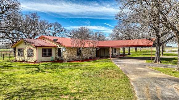 9.9 Acres of Land with Home for Sale in Millsap, Texas