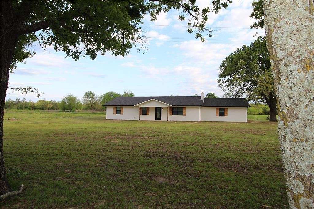 1.5 Acres of Residential Land with Home for Sale in Arthur City, Texas