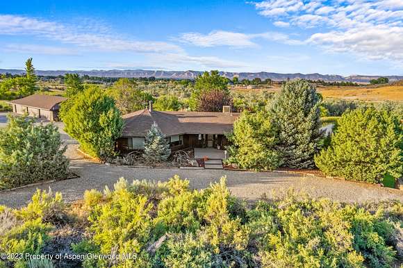 5.6 Acres of Residential Land with Home for Sale in Grand Junction, Colorado
