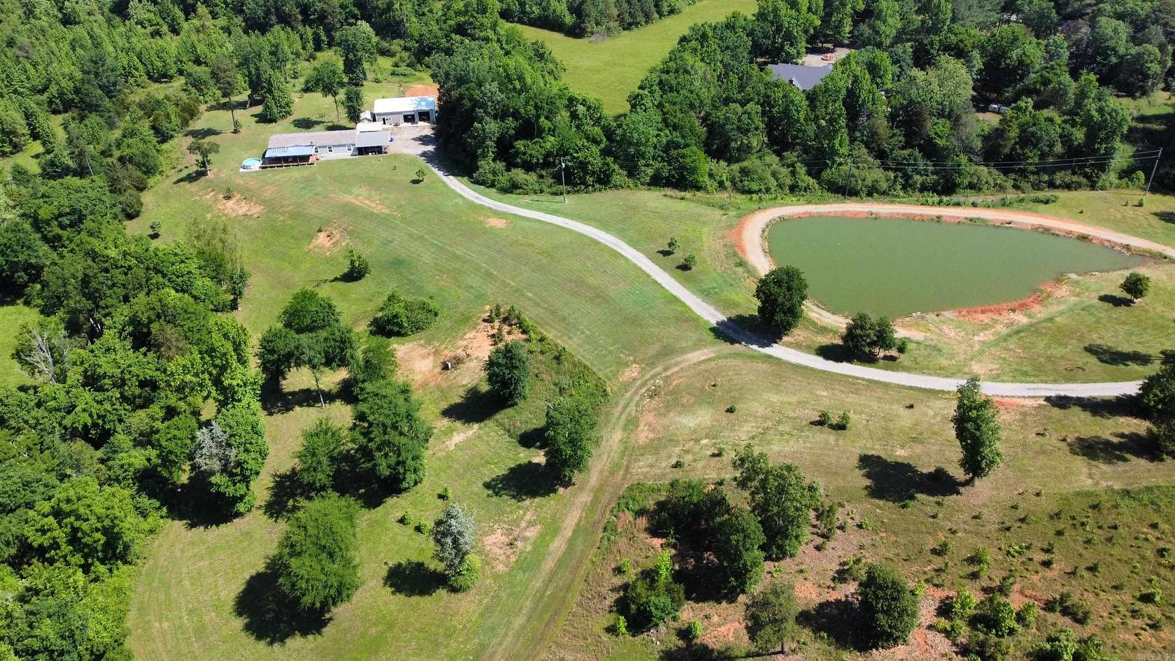 24.4 Acres of Recreational Land with Home for Sale in Clarksville, Arkansas