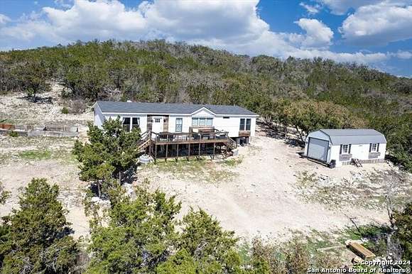 11.8 Acres of Land with Home for Sale in Hondo, Texas