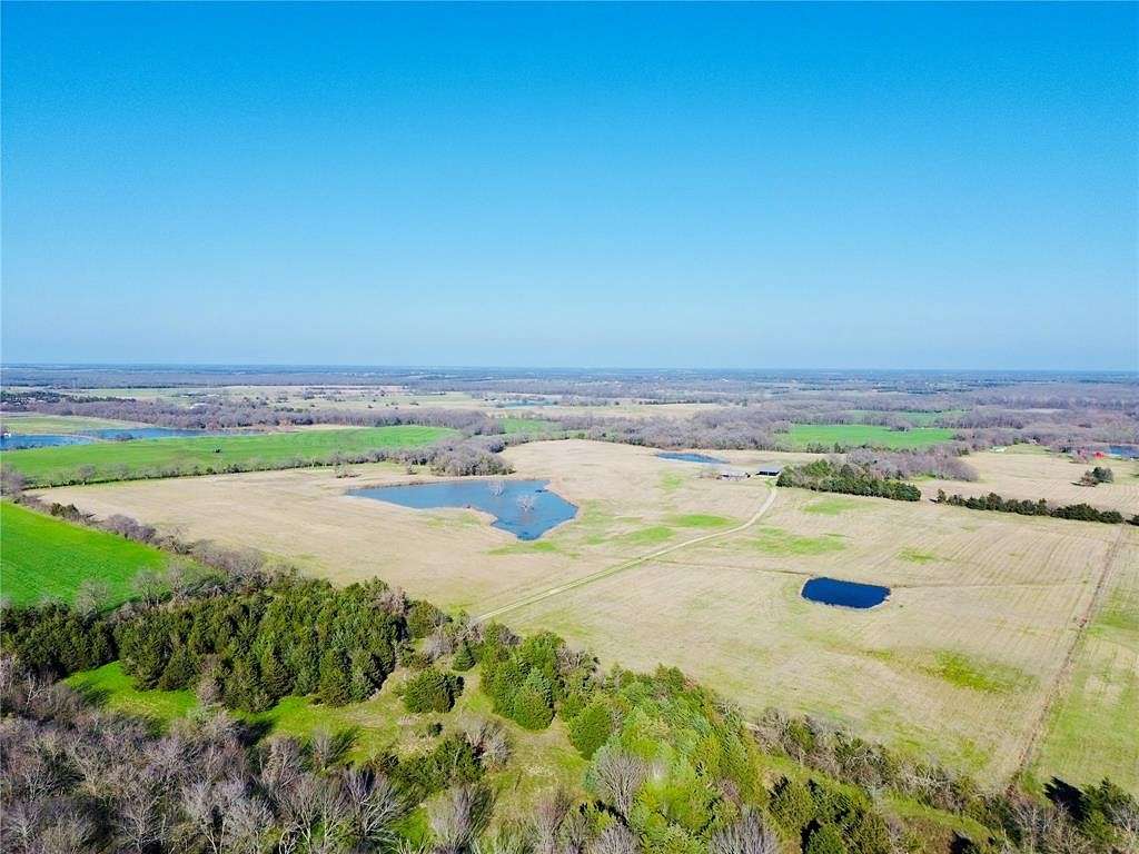 70.2 Acres of Land with Home for Sale in Paris, Texas