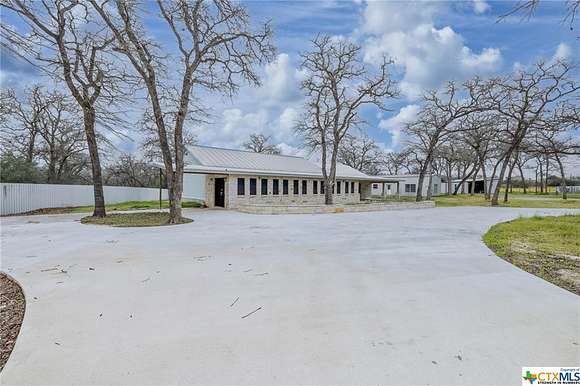 10.6 Acres of Land with Home for Sale in Luling, Texas