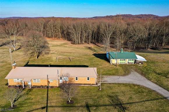 4.7 Acres of Residential Land with Home for Auction in Beach City, Ohio