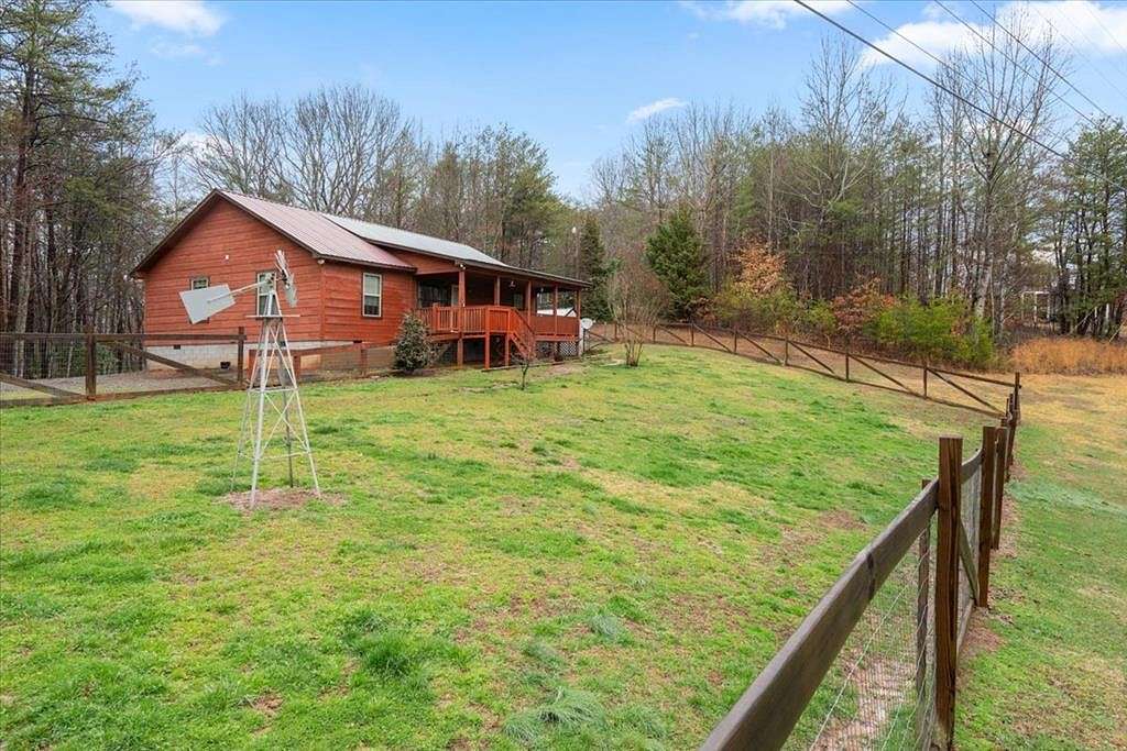 2.9 Acres of Residential Land with Home for Sale in Hiawassee, Georgia