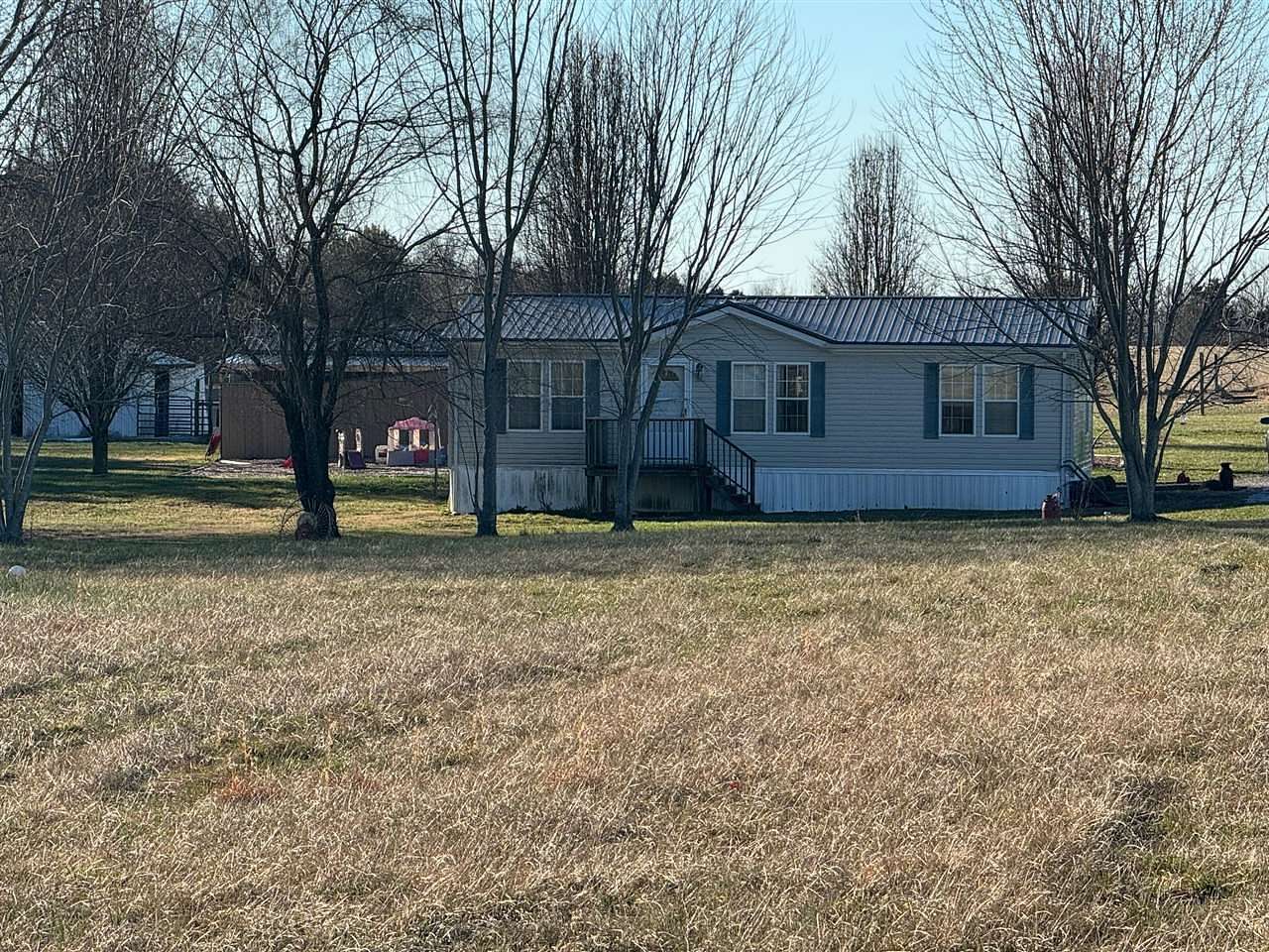 4.1 Acres of Residential Land with Home for Sale in Bowling Green, Kentucky