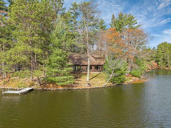 13.1 Acres of Land with Home for Sale in Three Lakes, Wisconsin