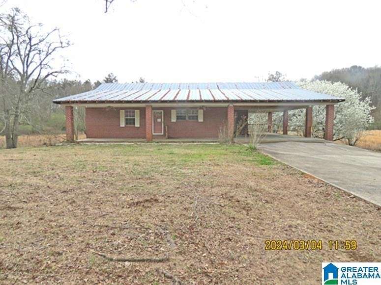 6.9 Acres of Residential Land with Home for Sale in Pell City, Alabama