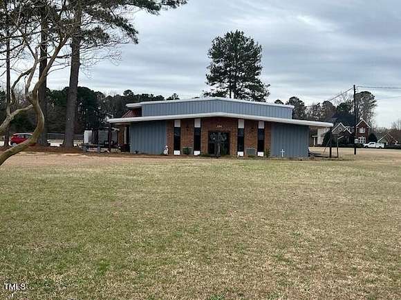2.3 Acres of Residential Land with Home for Sale in Erwin, North Carolina