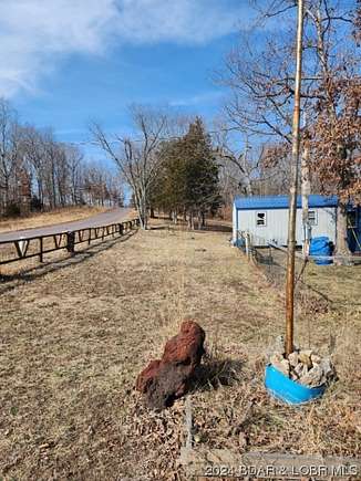 4.8 Acres of Residential Land with Home for Sale in Versailles, Missouri