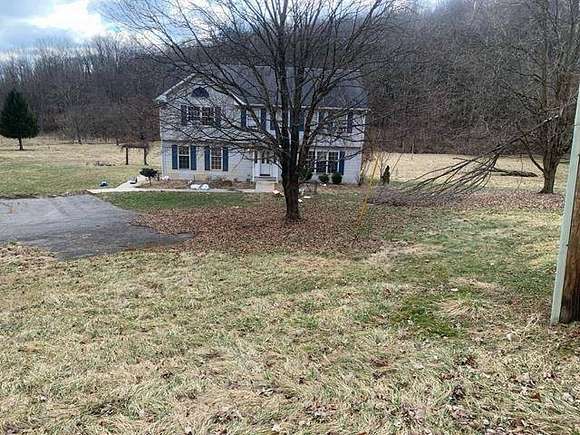 2.5 Acres of Residential Land with Home for Auction in Claysville, Pennsylvania