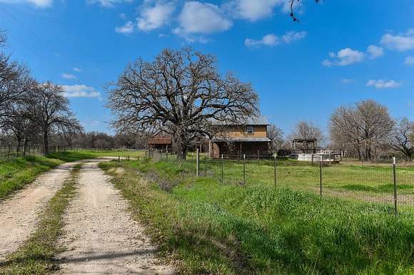 5.1 Acres of Residential Land with Home for Sale in Grandview, Texas