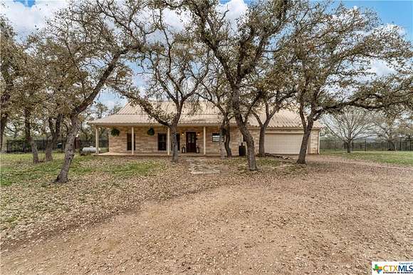 5.1 Acres of Residential Land with Home for Sale in Wimberley, Texas
