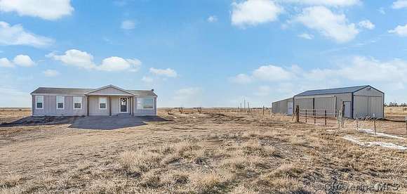 5 Acres of Land with Home for Sale in Burns, Wyoming