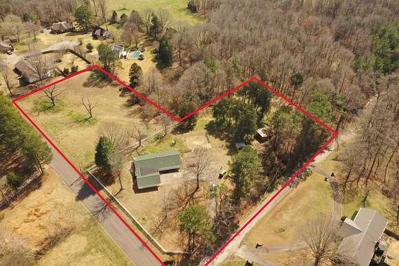 3.7 Acres of Residential Land with Home for Sale in Bolivar, Tennessee