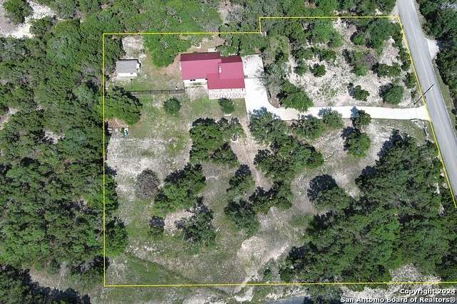 2.5 Acres of Residential Land with Home for Sale in Canyon Lake, Texas