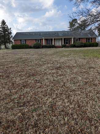 19.6 Acres of Land with Home for Sale in Halls, Tennessee