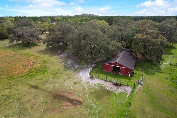 12.2 Acres of Land with Home for Sale in Spring Hill, Florida