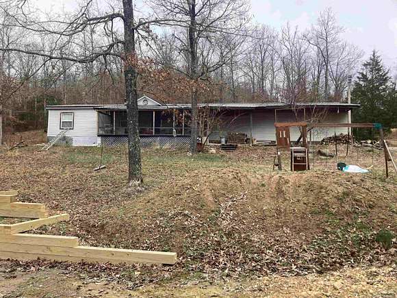 5 Acres of Land with Home for Sale in Mountain View, Arkansas