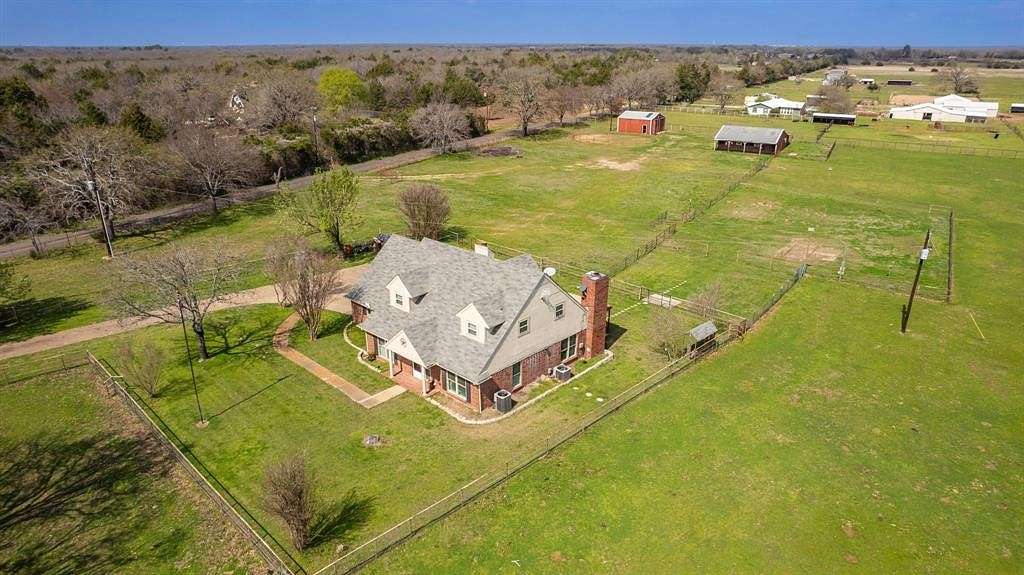 10.9 Acres of Land with Home for Sale in Quinlan, Texas