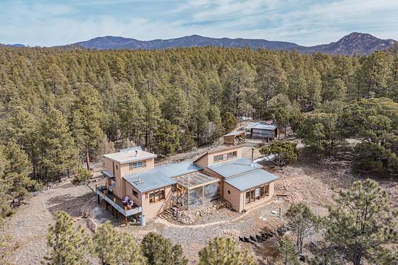 6.9 Acres of Residential Land with Home for Sale in Santa Fe, New Mexico