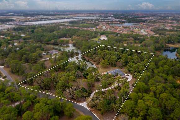 6.8 Acres of Residential Land with Home for Sale in Venice, Florida