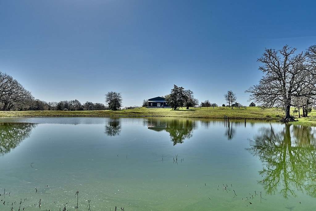 13.5 Acres of Land with Home for Sale in Giddings, Texas