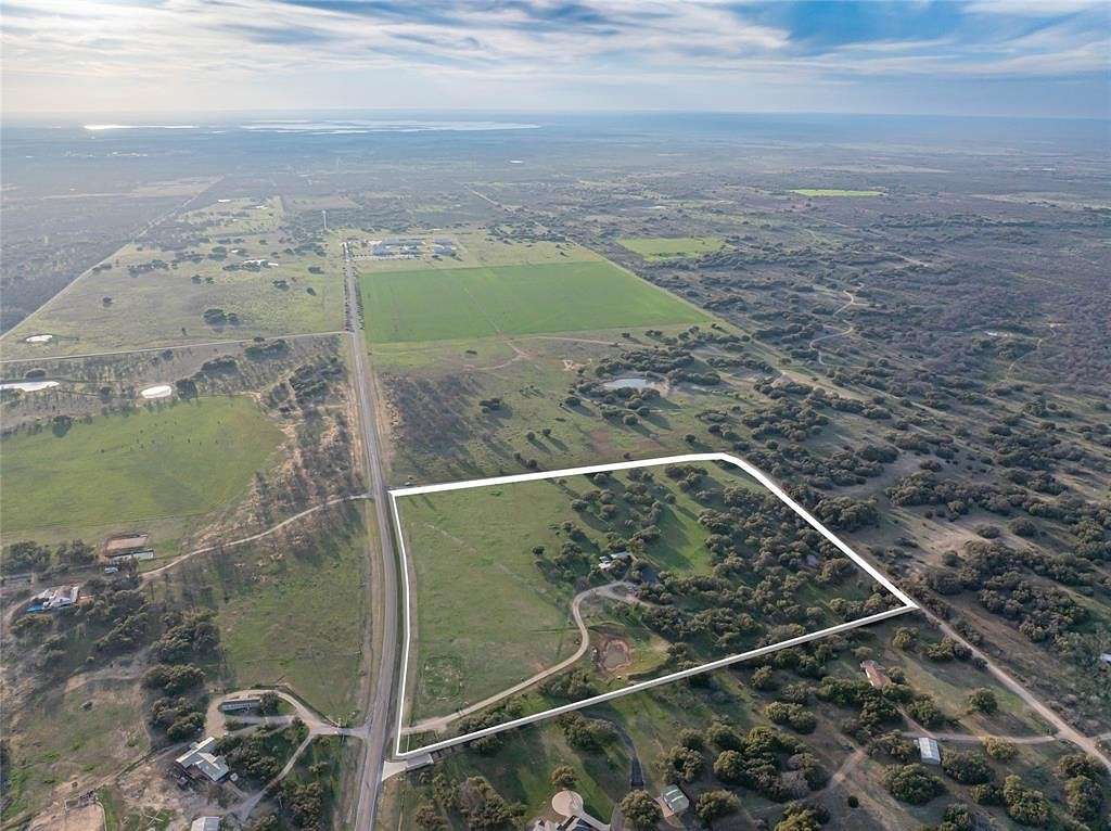 24.6 Acres of Agricultural Land with Home for Sale in Breckenridge, Texas