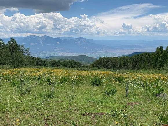 401 Acres of Land with Home for Sale in Hotchkiss, Colorado