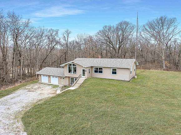 3.8 Acres of Residential Land with Home for Sale in Pierceton, Indiana