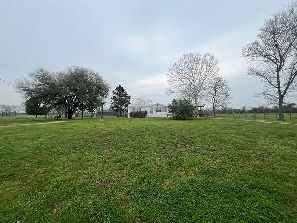 33.9 Acres of Agricultural Land with Home for Sale in West Point, Texas