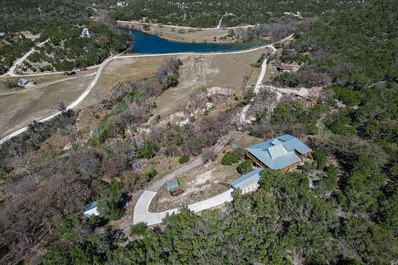 7.2 Acres of Residential Land with Home for Sale in Camp Wood, Texas