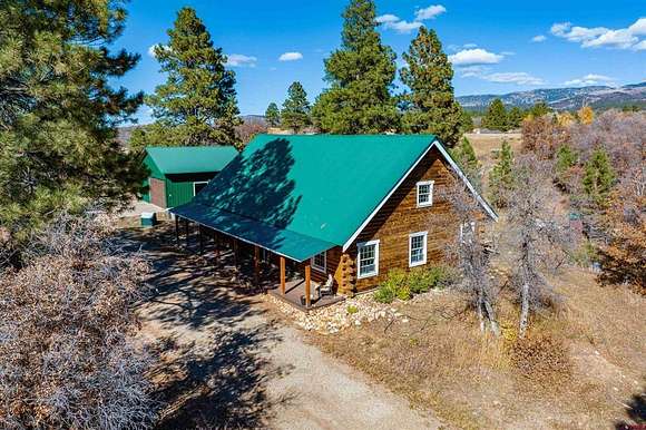 5 Acres of Residential Land with Home for Sale in Mancos, Colorado