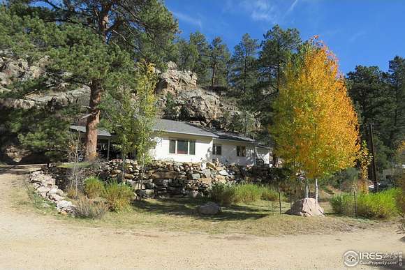 7.4 Acres of Residential Land with Home for Sale in Drake, Colorado