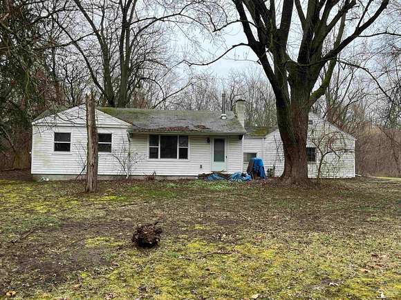 4.8 Acres of Residential Land with Home for Auction in Lambertville, Michigan