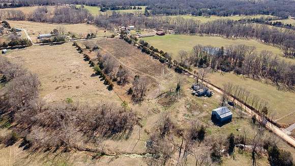 12.4 Acres of Land with Home for Sale in Garfield, Arkansas