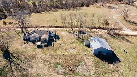 2.4 Acres of Residential Land with Home for Sale in Garfield, Arkansas
