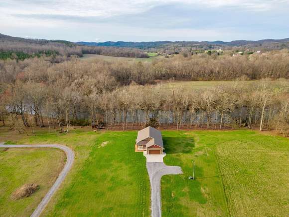 5 Acres of Residential Land with Home for Sale in Benton, Tennessee