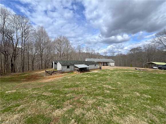 41.2 Acres of Agricultural Land with Home for Sale in Madison, North Carolina