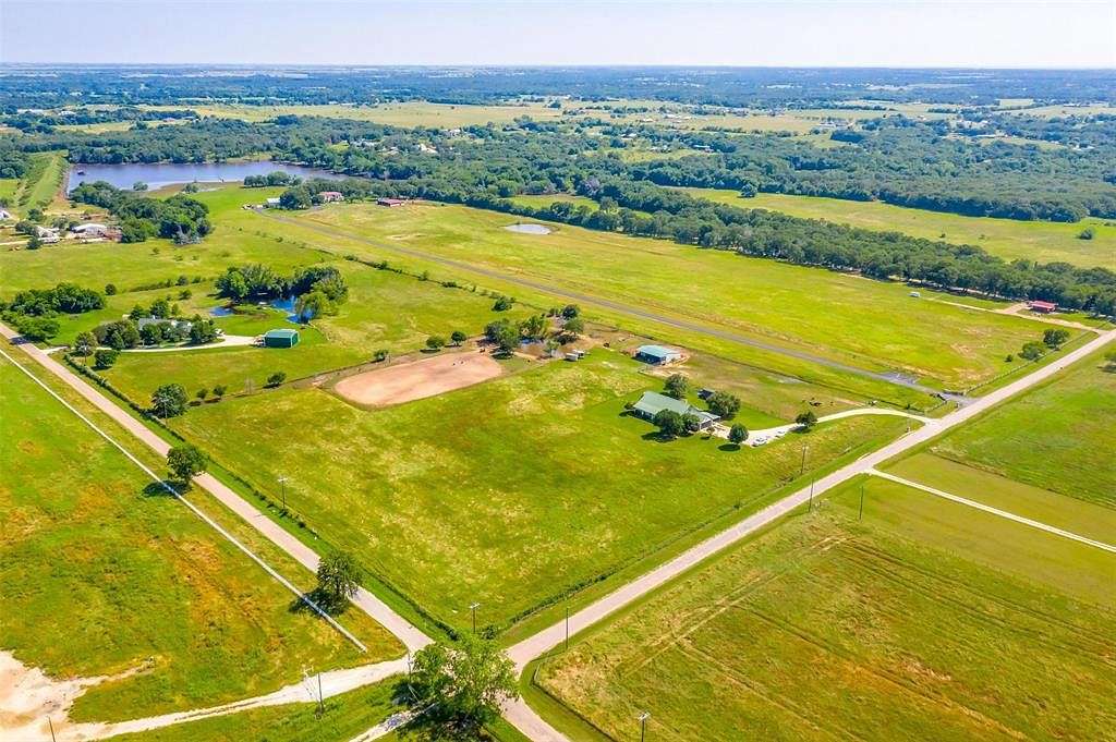 10 Acres of Residential Land with Home for Sale in Grandview, Texas