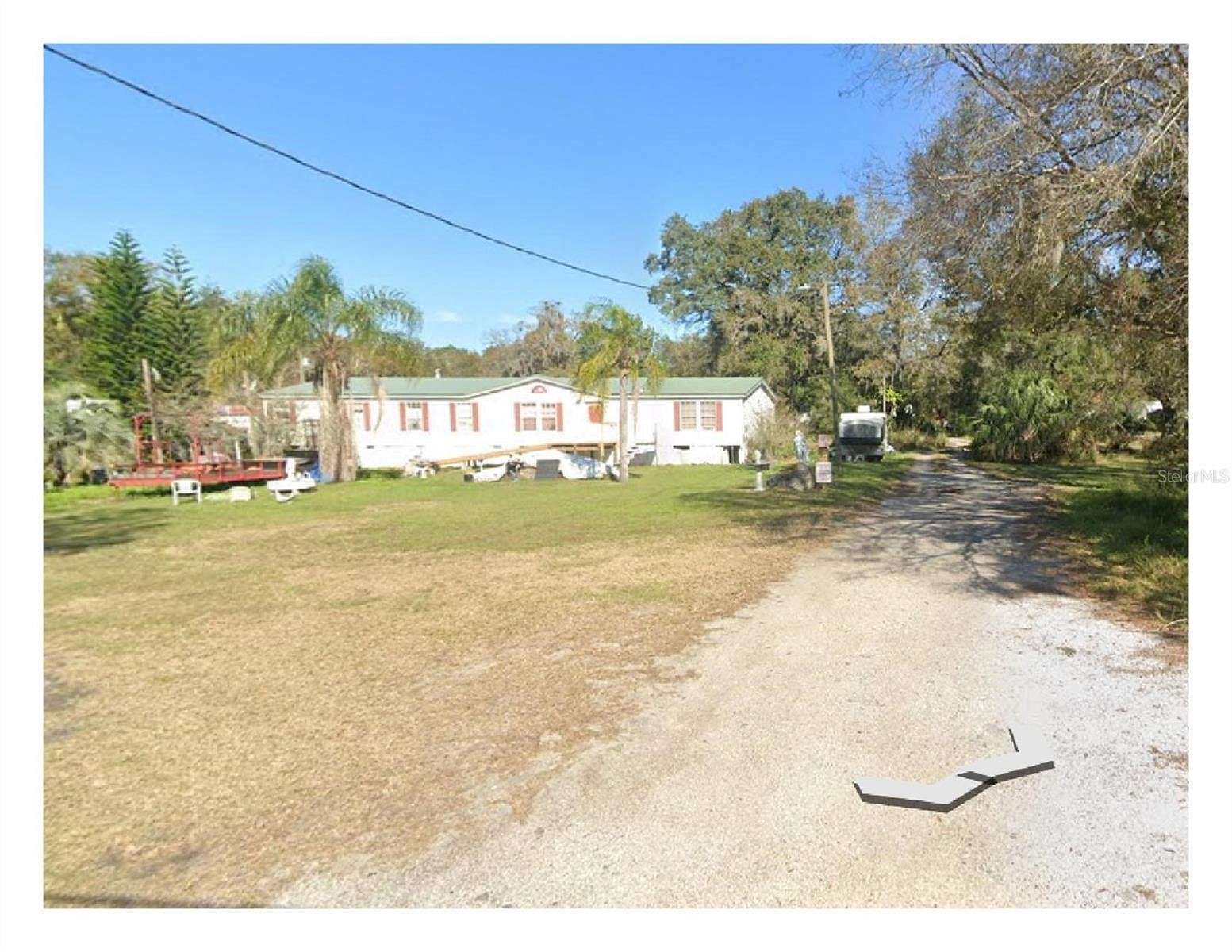 2.5 Acres of Residential Land with Home for Sale in Gibsonton, Florida
