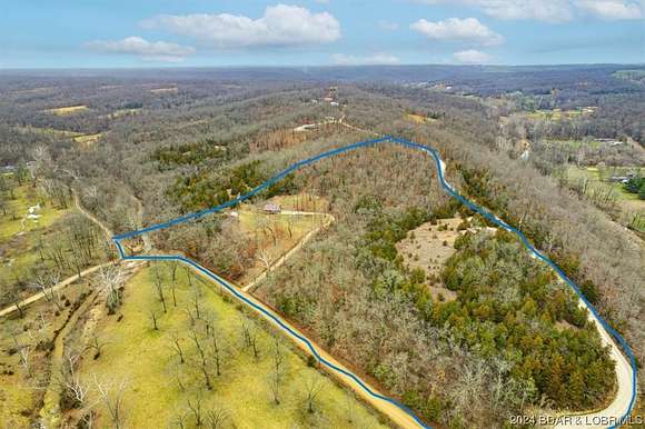 14.7 Acres of Recreational Land with Home for Sale in Eldon, Missouri