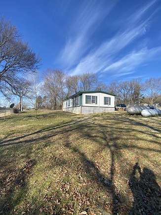 17.3 Acres of Land with Home for Sale in Eagle Rock, Missouri
