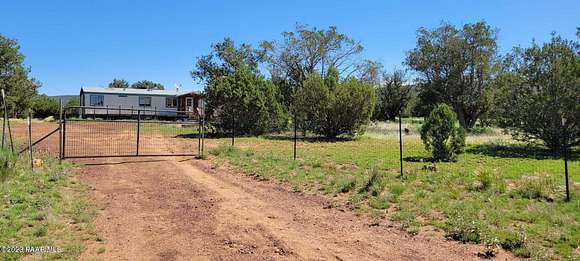 4.9 Acres of Residential Land with Home for Sale in Williams, Arizona