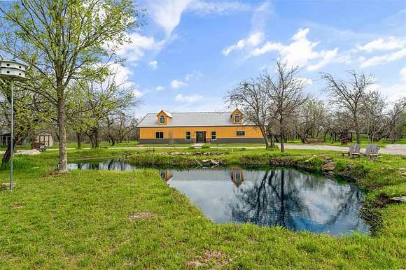 7.718 Acres of Land with Home for Sale in Mineral Wells, Texas