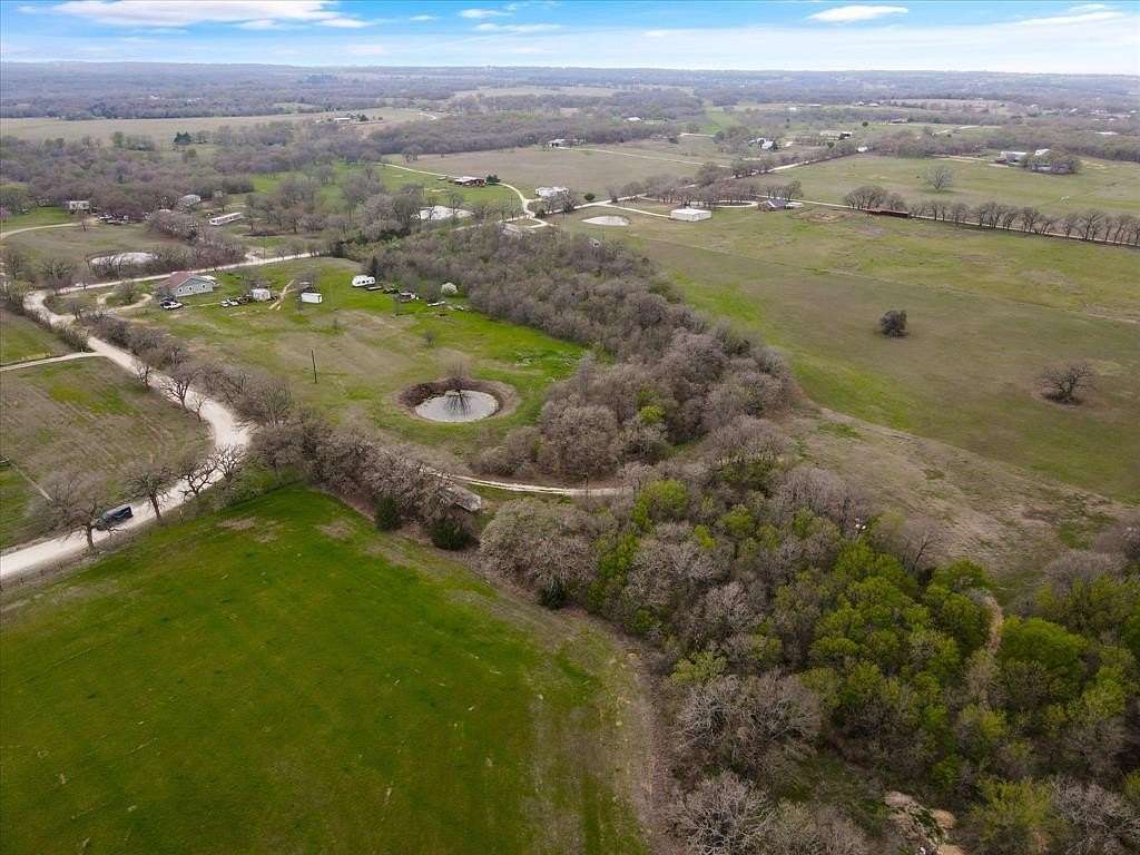 5 Acres of Residential Land with Home for Sale in Blum, Texas