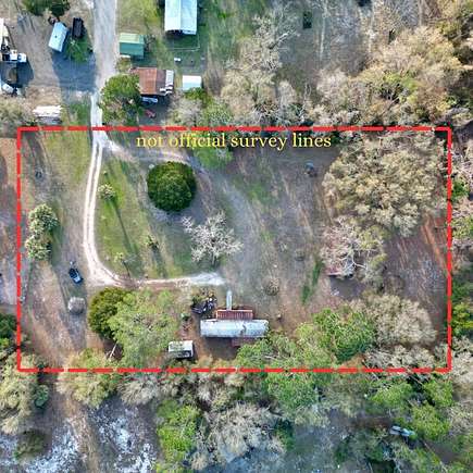 2 Acres of Residential Land with Home for Sale in Cross City, Florida