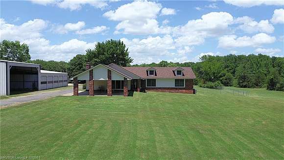 10 Acres of Residential Land with Home for Sale in Van Buren, Arkansas