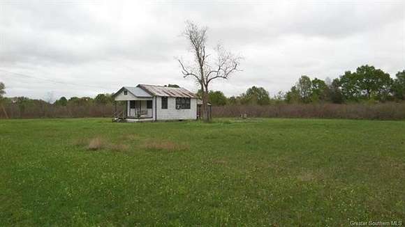 5.7 Acres of Residential Land with Home for Sale in Gueydan, Louisiana